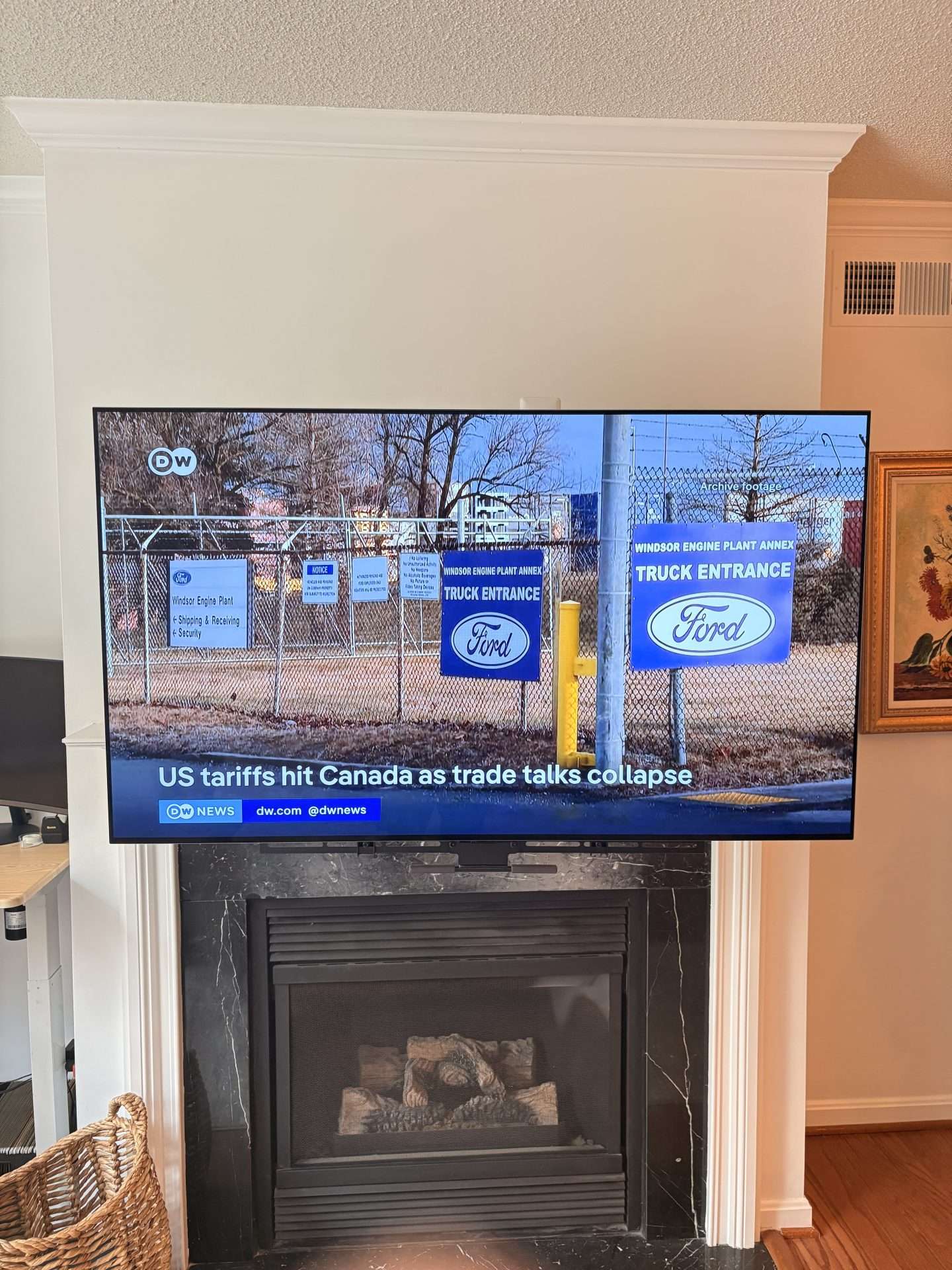 Custom wood backer installed across metal studs for fireplace TV mounting in Arlington