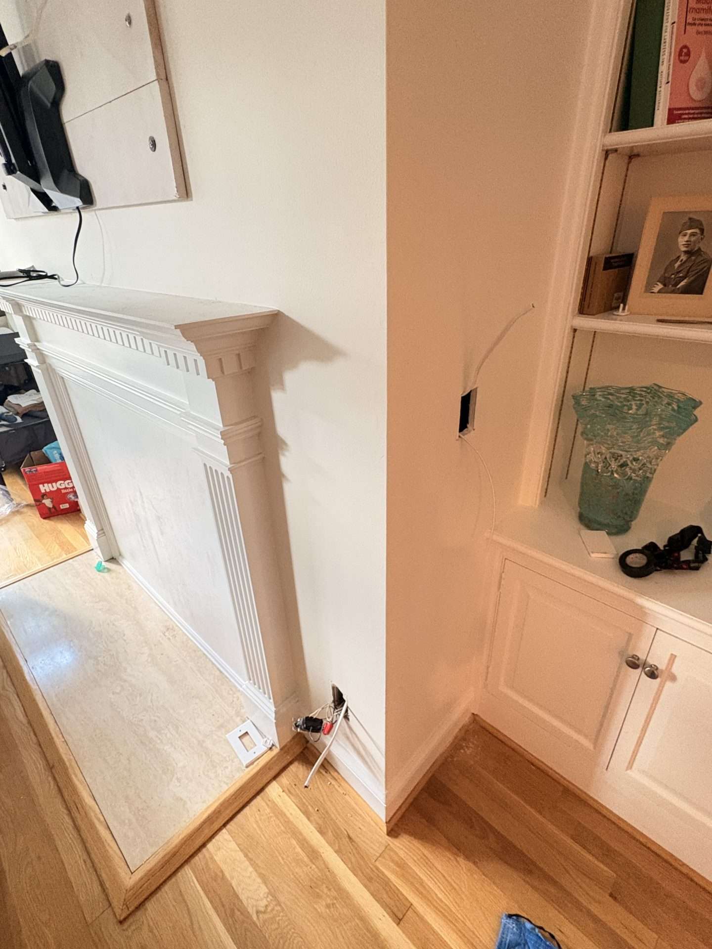 Electrical access during Georgetown fireplace TV mounting project