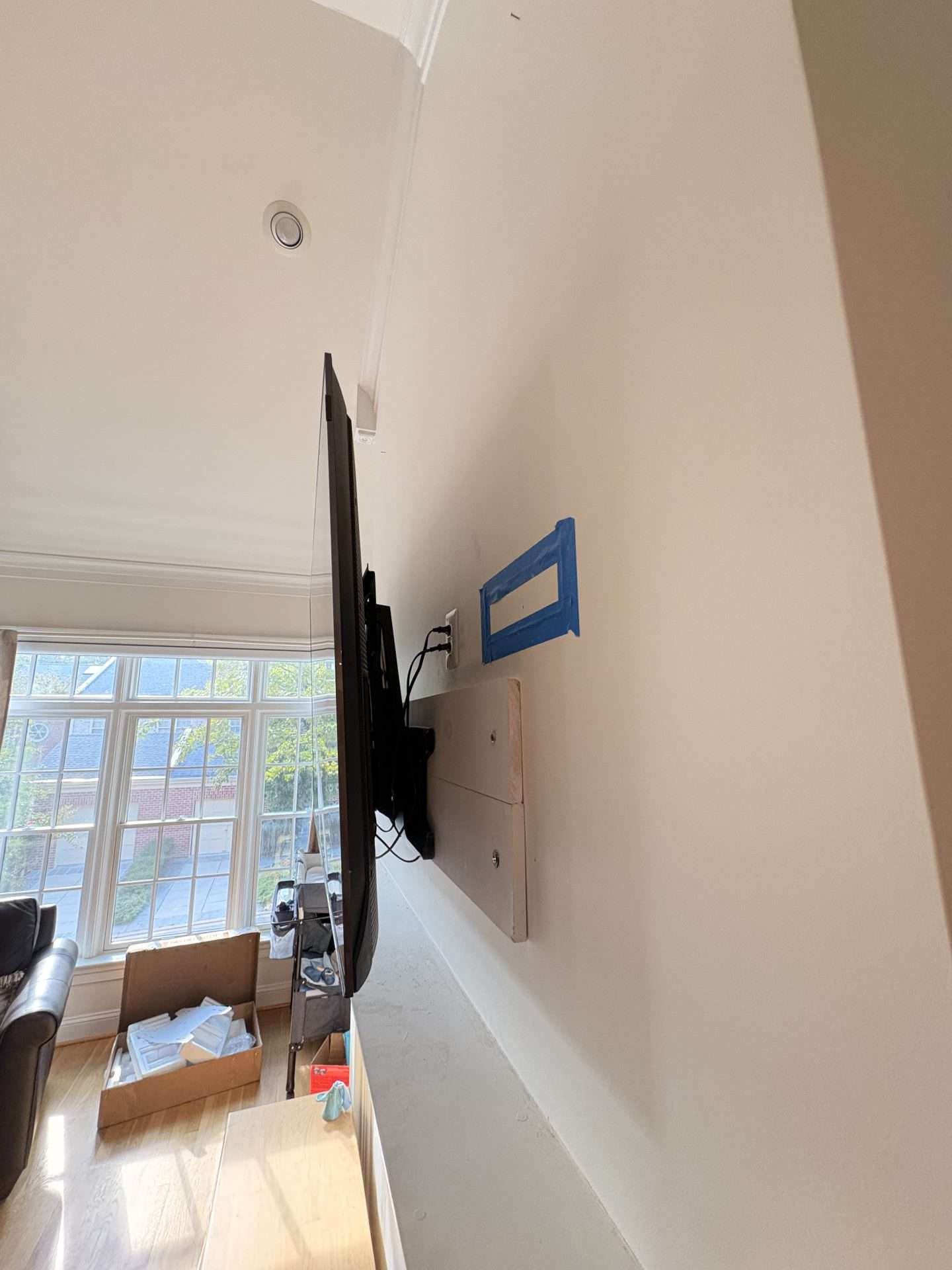 Side profile of fireplace television mount installation in Georgetown